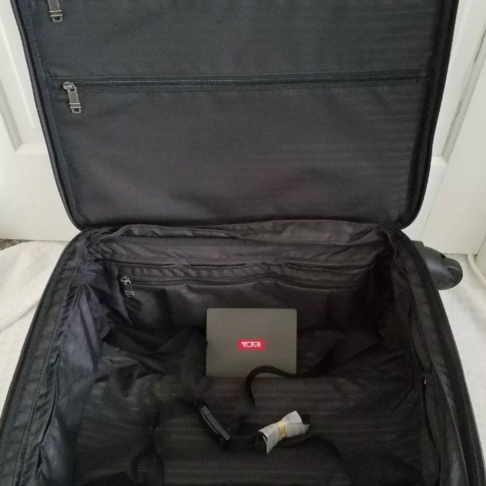 JUST LIKE NEW Tumi carry-on...used 1 time only.